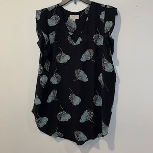 Green and black floral print blouse